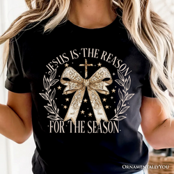 Jesus Is the Reason Christmas T‑Shirt, Coquette Gold Bow Cross Tee for Faithful Women