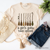 A Girl’s Gotta Have Options Witch T-Shirt, Funny Halloween Broomstick Tee for Witches