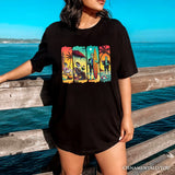 Frankenstein's Beach Vacation T-Shirt, Retro Neon Surf Style Tee for Horror Fans with Summer Vibes