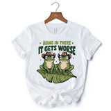 Hang In There It Gets Worse T-Shirt, White and Natural Funny Frog Tee with Dark Millennial Humor